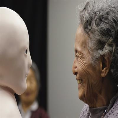 Cover image for research topic "Interaction in Robot-Assistive Elderly Care"