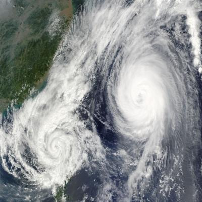 Cover image for research topic "Living with Tropical Storms in a Changing Climate"