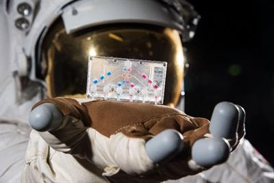 Cover image for research topic "Technologies for handling, preparation, and liquid-based analysis of fluidic samples in space"