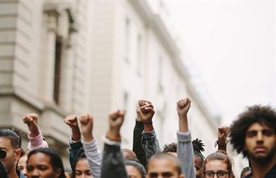 Cover image for research topic "Developing Democracy: Positive and Negative Effects of Youth Civic and Political Participation"