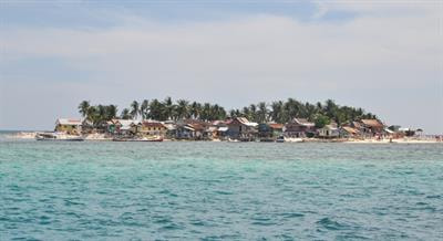 Cover image for research topic "Small Islands and Big Impacts – Studying Global and Local, Ecological and Social Effects on Coral Reef Ecosystems"