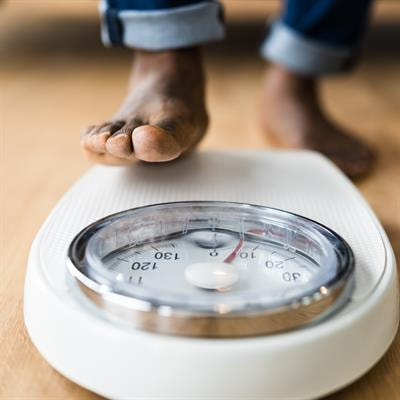 Cover image for research topic "The Mental Health Impact of Weight Stigma"