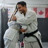 Cover image for research topic "Combat Sports and Wellbeing: Advancing Health and Inclusion in Athletes and Practitioners"