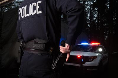 Cover image for research topic "De-escalating Threat: The Psychophysiology of Police Decision Making"