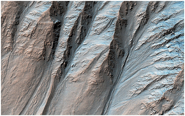 Figure 1 - This image, from NASA, shows gullies on the surface of Mars.