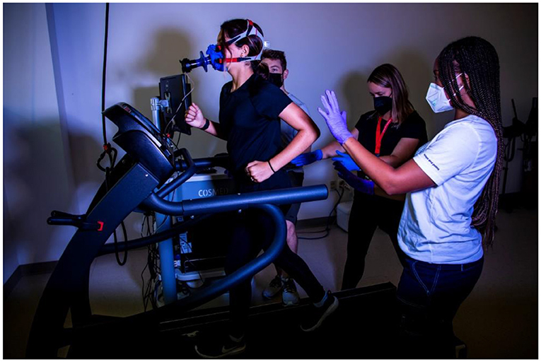 Figure 1 - A 14-year-old performing an exercise test on a treadmill to measure aerobic fitness.