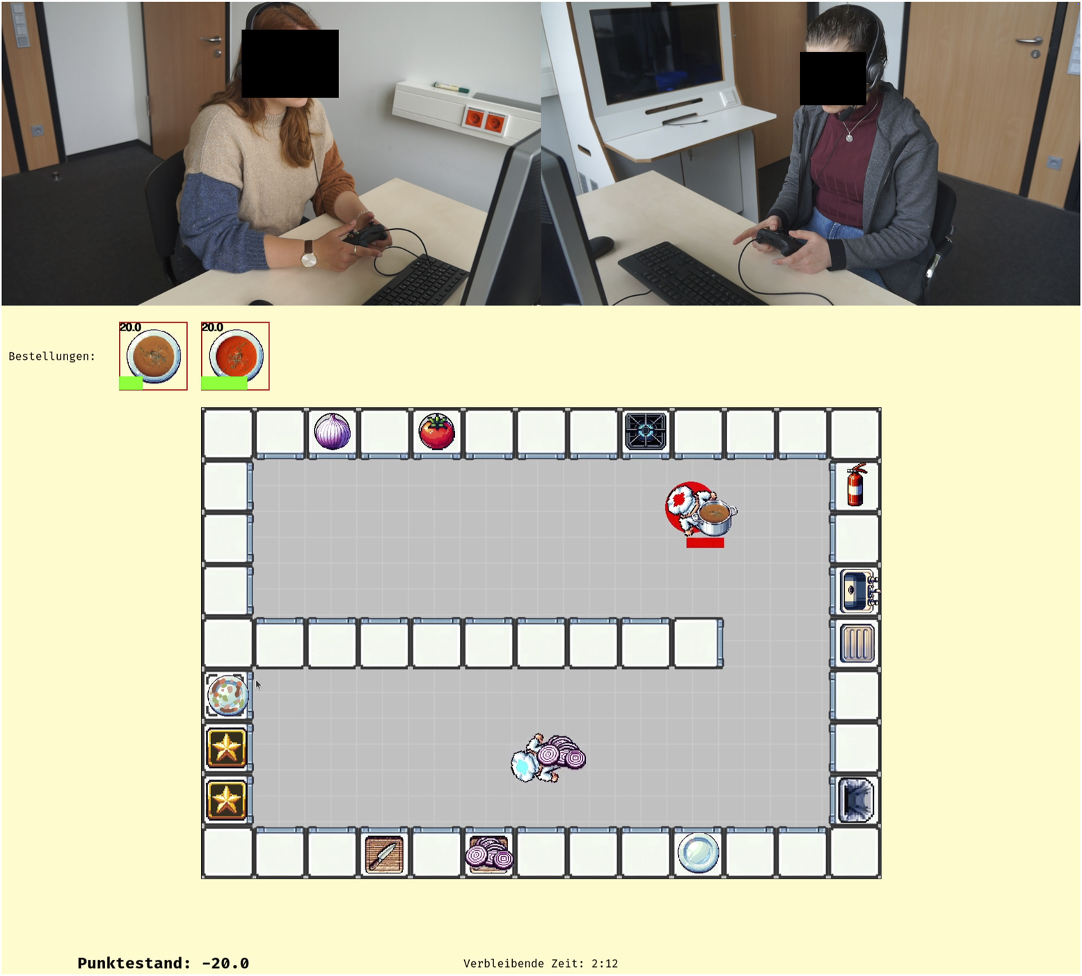 Two people sit in front of computers, wearing headphones and using game controllers. Below, a cooking-themed 2D video game displays a kitchen layout with ingredients like onions and tomatoes, along with order icons and a score of -20.0. Two chef player characters are visible.