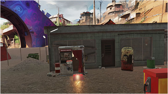 A game environment depicting a rundown urban area with buildings in disrepair. A small kiosk labeled