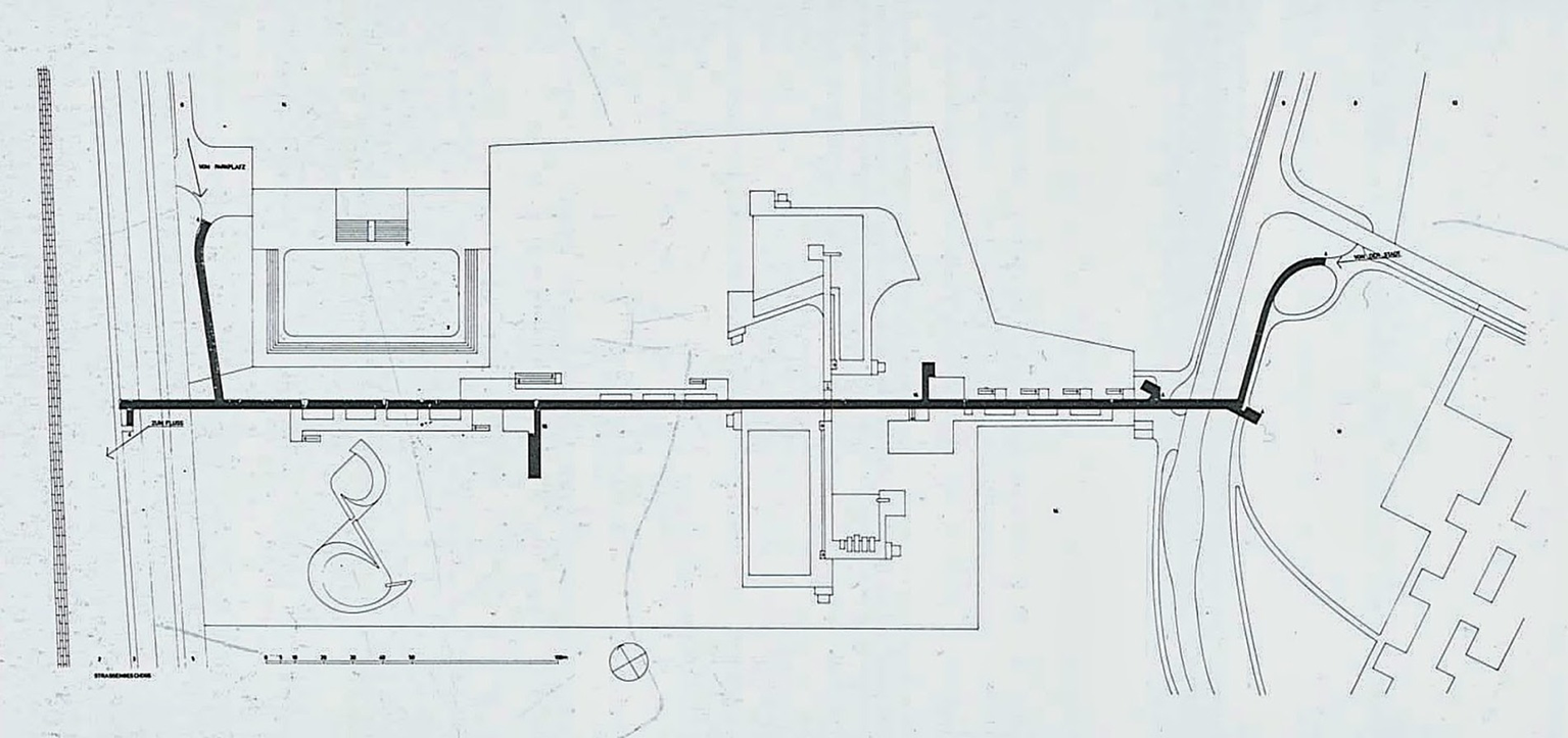 Floor plan showing a layout with labeled sections including main entrances, pathways, and structures. The diagram features directional lines and architectural elements such as rooms and corridors, indicating spatial relationships and access points.