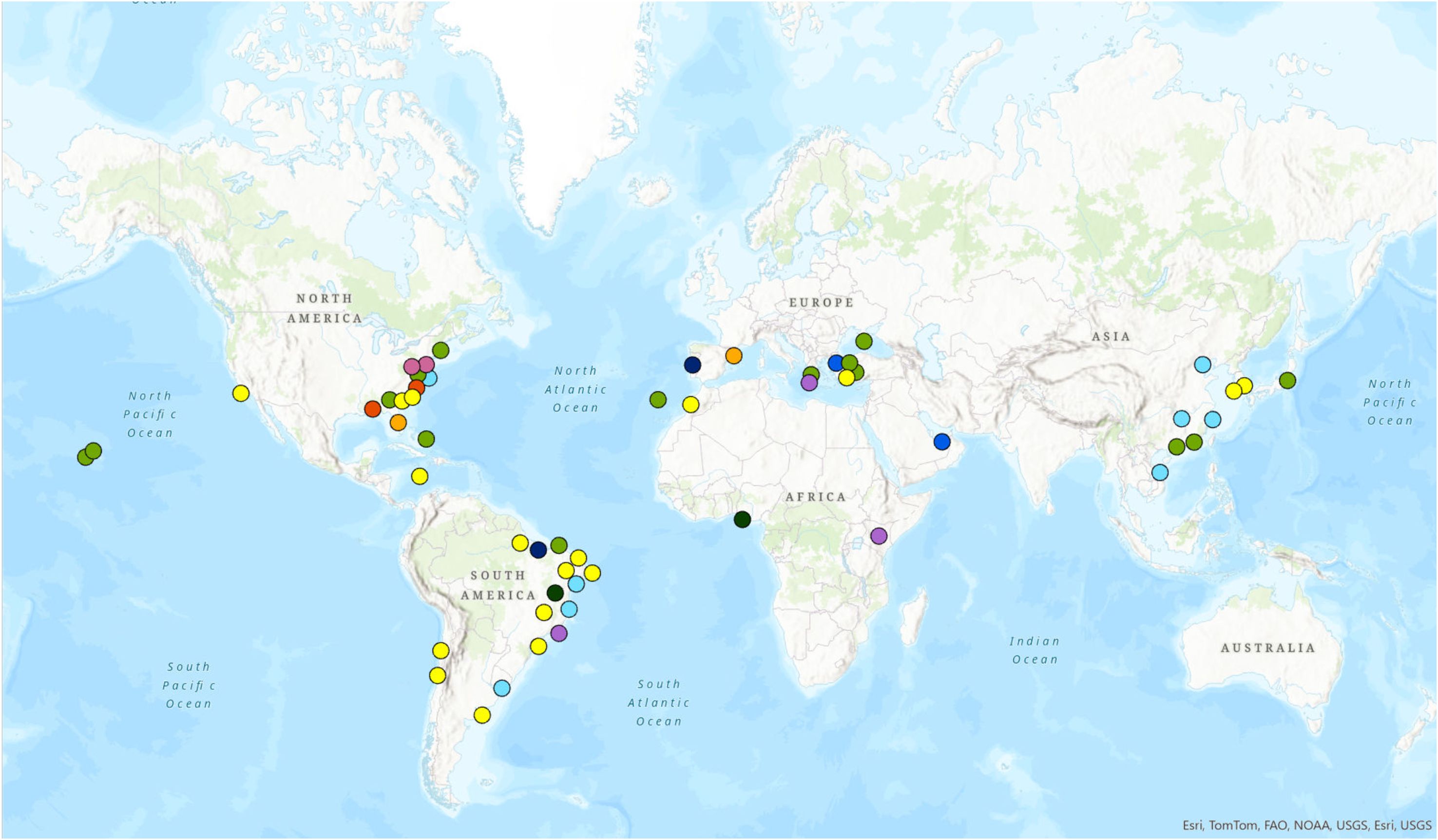 World map displaying various colored dots representing different locations across continents. The dots are scattered across North and South America, Europe, Africa, and Asia. The colors signify different categories or data points. Oceans and continents are labeled.