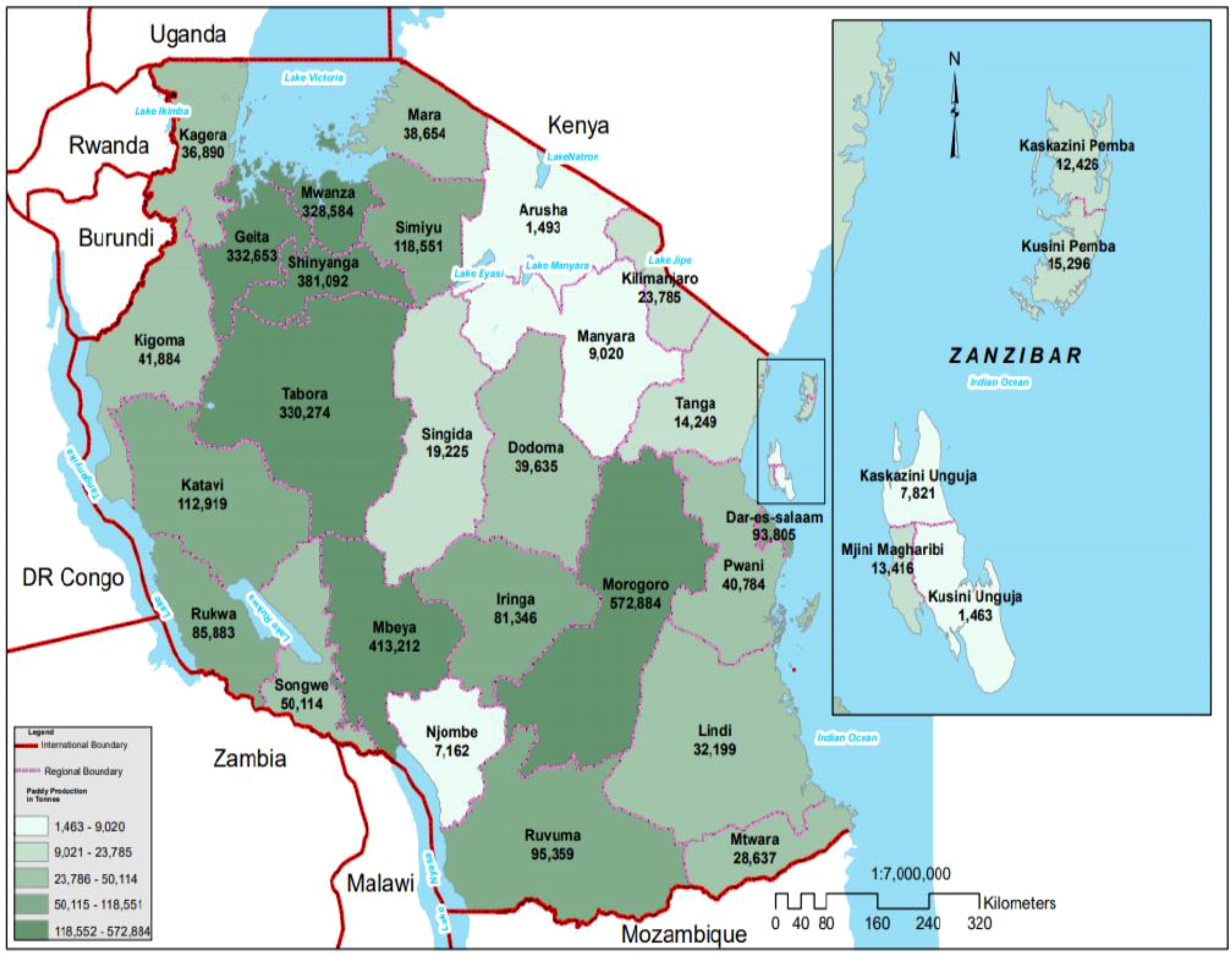 Map of Tanzania showing regional boundaries and paddy production areas, with production figures ranging from 1,463 to 572,884 tons. It features international borders with countries like Uganda, Kenya, and Mozambique, as well as regions such as Mbeya and Morogoro. An inset shows the Zanzibar archipelago, highlighting regions like Kaskazini Pemba and Mjini Magharibi.