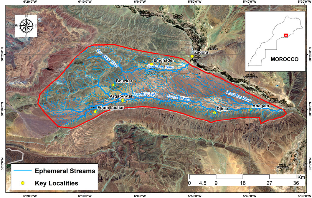 Map highlighting an area in Morocco with ephemeral streams in blue and key localities marked with yellow dots. Towns such as Bouzkar, Argab-n-tal, Foum Lachar, Lmghader, Djinia, and Anagam are labeled within the outlined region. A compass rose indicates direction, and a scale bar is provided for distance measurement. An inset map shows the location within Morocco.