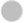 A smooth, reflective silver coin with decorative patterns around the edges and an inscription in the center.