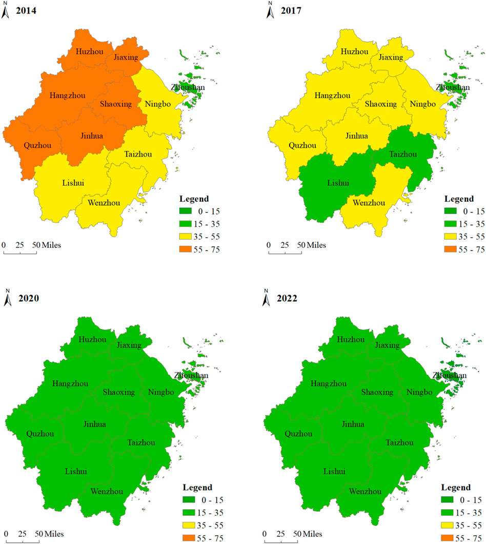 Maps of a region in China show changes in data from 2014, 2017, 2020, and 2022. Color-coded categories are 0-15, 15-35, 35-55, and 55-75, represented by green, yellow, orange, and red, respectively. Over time, the maps show a transition from predominantly orange and yellow in 2014 to completely green by 2022, indicating a shift to the 0-15 category. Key cities labeled include Hangzhou, Ningbo, and Wenzhou.