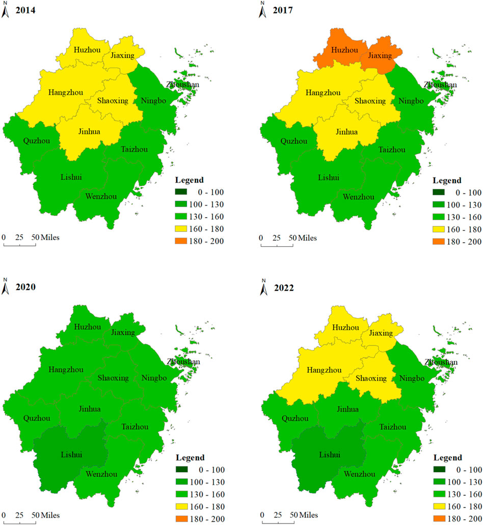 Four maps show changes in pollution levels across a region from 2014 to 2022. Each map is color-coded: dark green (0-100), green (100-130), light green (130-160), yellow (160-180), orange (180-200). In 2014, areas are predominantly green and yellow. By 2017, orange appears in the north. In 2020, all areas revert to green. By 2022, green and yellow dominate, indicating variable pollution levels over time.