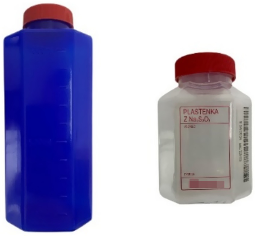 Two plastic bottles are shown. The left bottle is tall, rectangular, and blue with a red cap. The right bottle is white, smaller, has a red cap, and a label with text.
