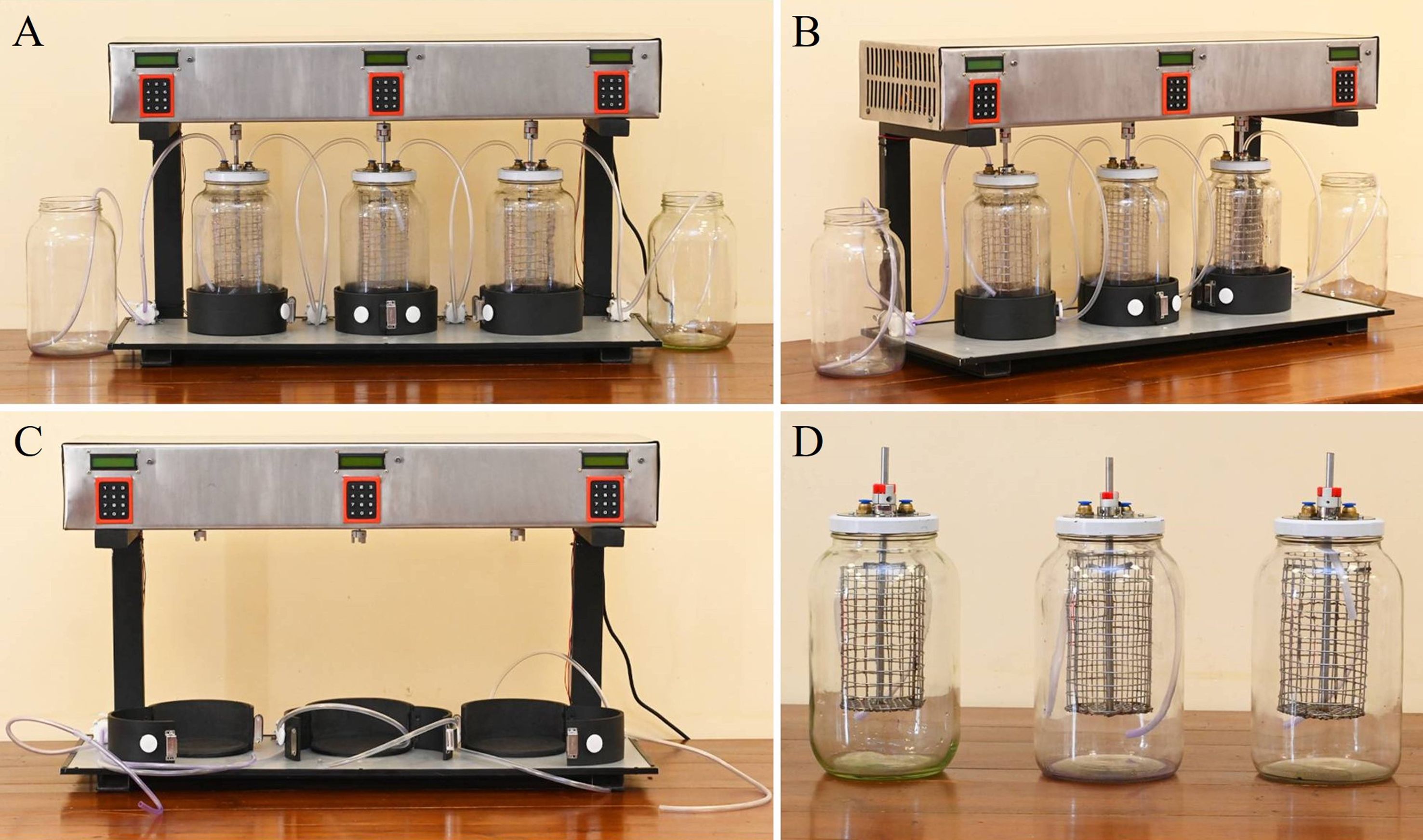 Laboratory equipment is shown in four panels labeled A, B, C, and D. Panels A and B display two views of a setup with three glass jars with mesh inserts connected to tubing and electronic controls. Panel C shows a similar setup without jars. Panel D highlights three individual jars with mesh inserts and capped tops, containing metal components and tubing connections.