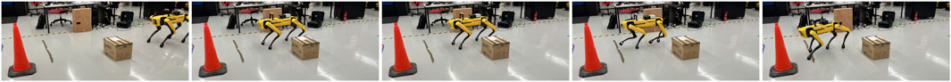 A series of five images shows a yellow robotic dog interacting with a cardboard box in a room with orange traffic cones and various equipment. The robot approaches and positions itself around the box.