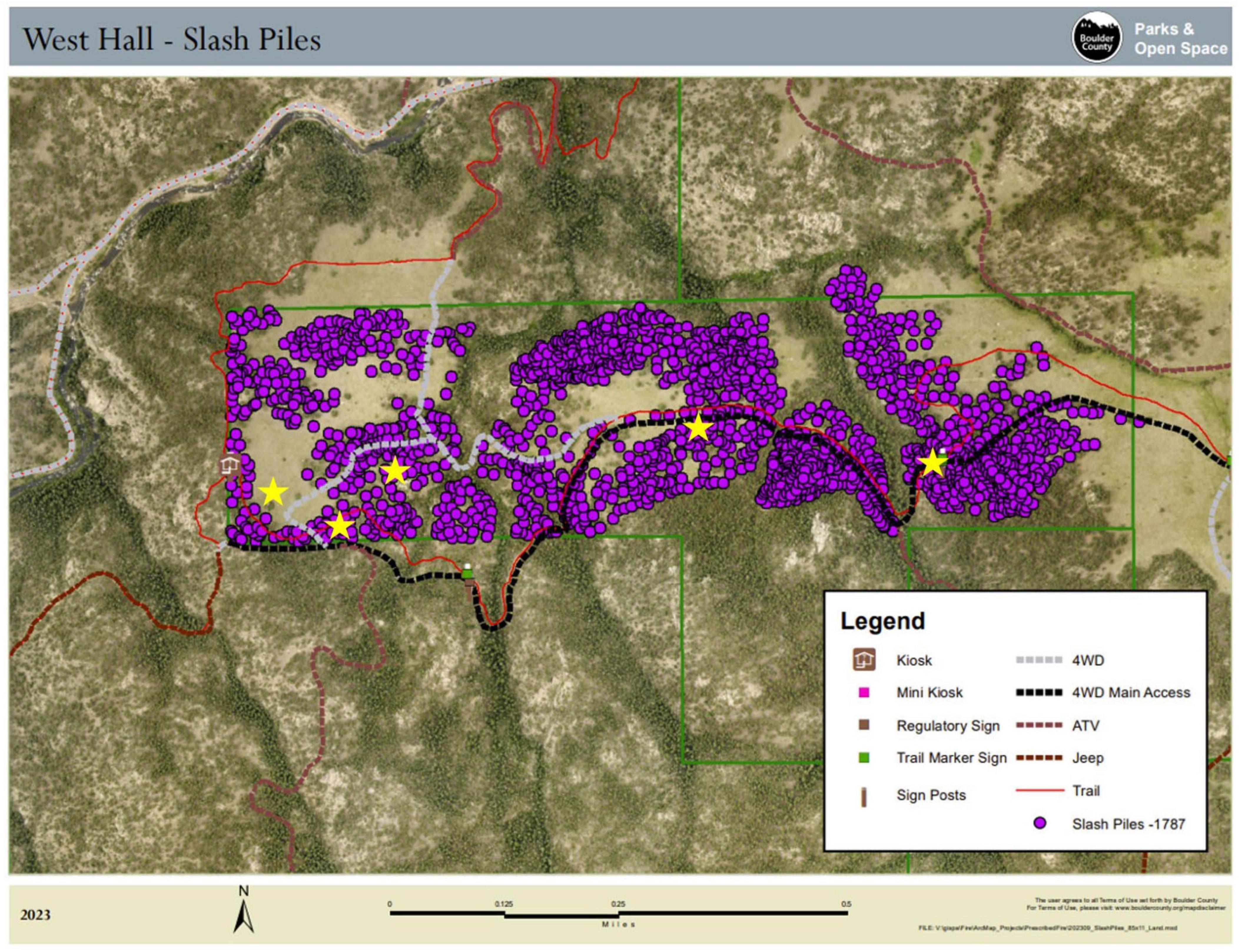 Map of West Hall showing slash piles marked with purple dots, totaling 1,787. Yellow stars indicate piles measured during the study. The legend details trails, vehicle access, and signs. Terrain features are visible in the background.