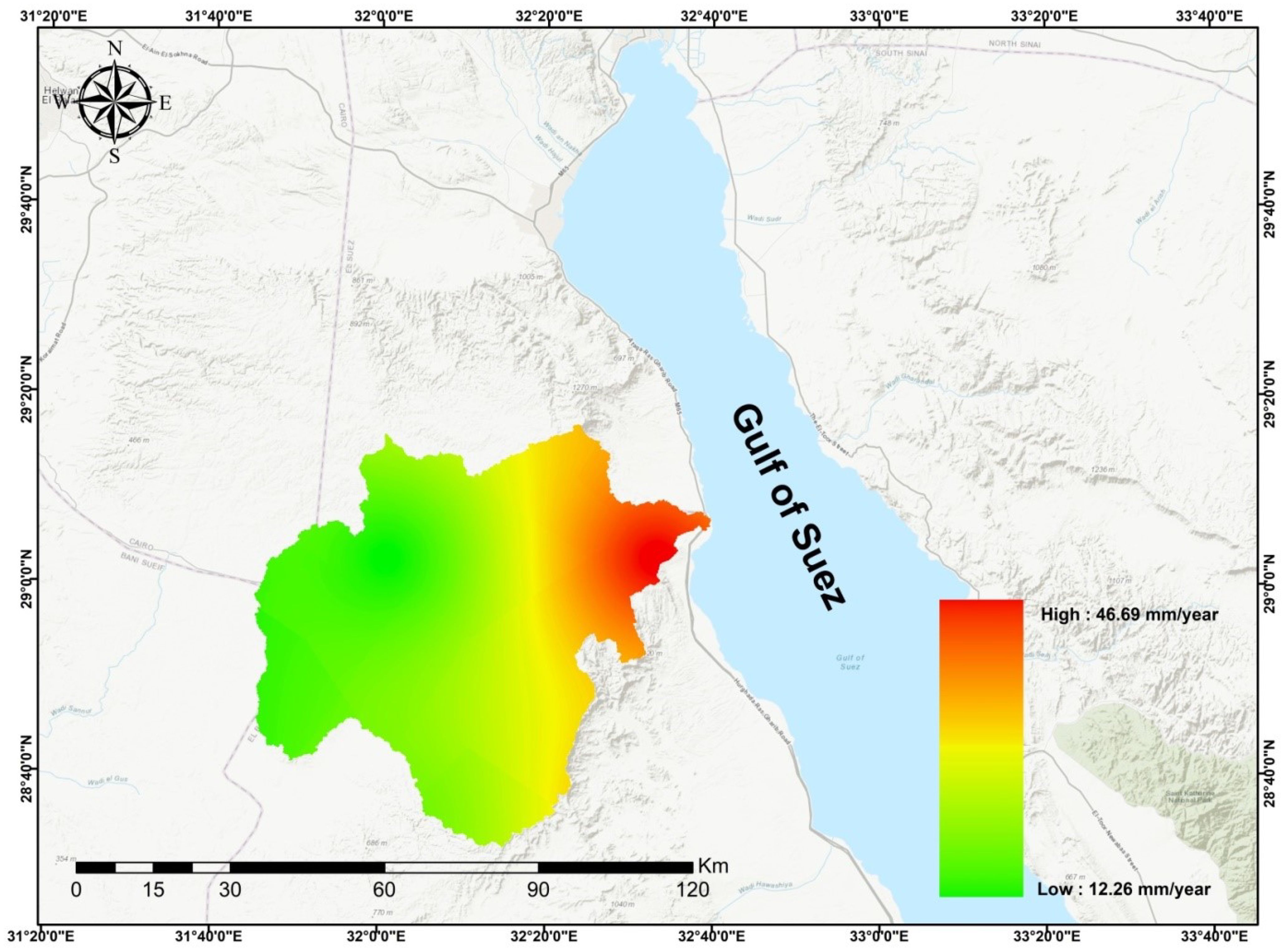 Map of the area around the Gulf of Suez showing rainfall distribution with a color gradient from green to red. Green indicates lower rainfall (12.26 mm/year), and red indicates higher rainfall (46.69 mm/year). A compass rose is in the top left corner, and a scale bar is at the bottom.