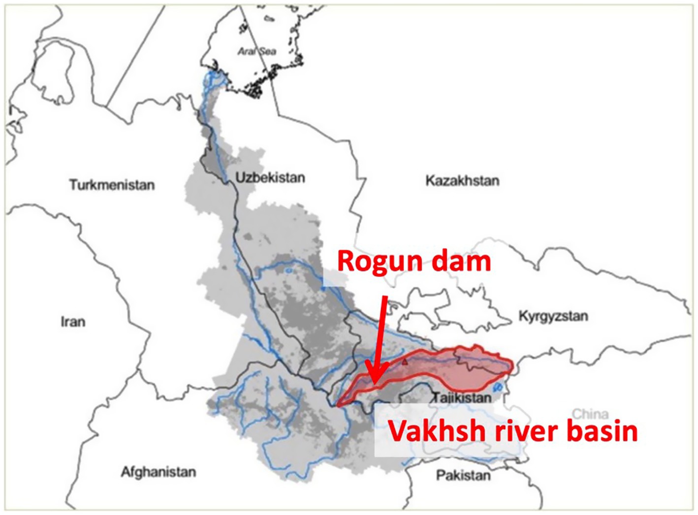 Map highlighting Central Asian countries with the Vakhsh River basin shaded in red, extending across Tajikistan. A red arrow points to the location of the Rogun Dam.
