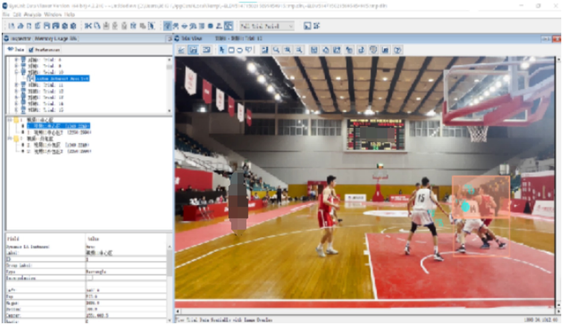Screenshot of a software window displaying an image analyzed with a basketball game in progress. The image shows players on a court, with some details pixelated and annotated with a transparent overlay. The software interface includes a file explorer and a properties panel.