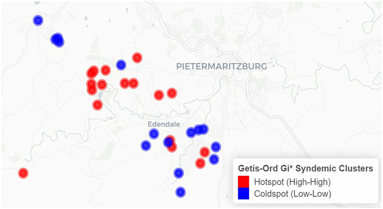 Map showing Getis-Ord Gi syndemic clusters in Pietermaritzburg, with red dots indicating hotspots and blue dots indicating coldspots. Clusters are concentrated around Edendale.