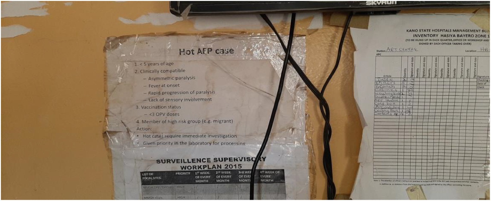 A wall features a notice detailing criteria for diagnosing a