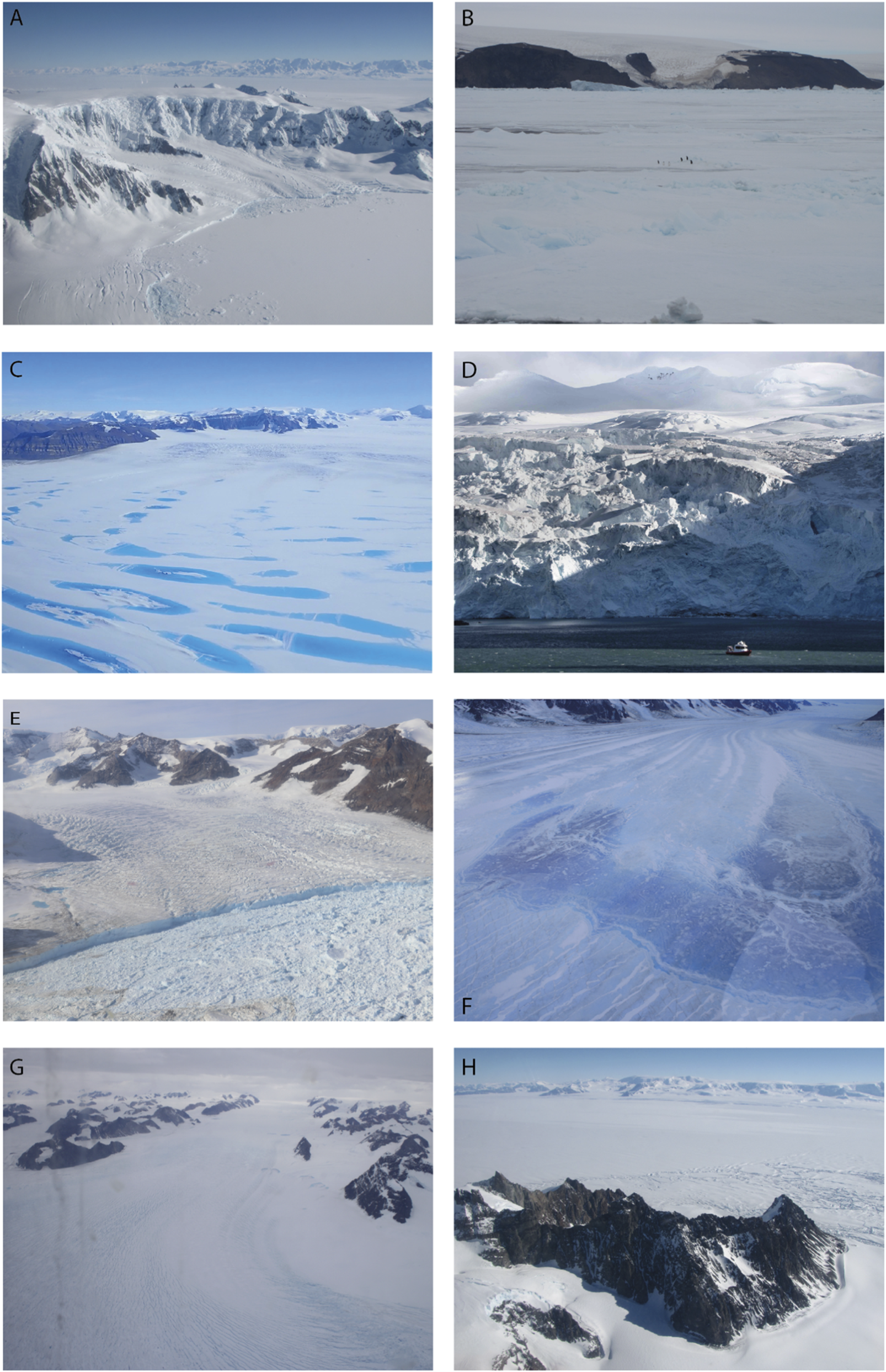 A. Snow-covered mountains with steep cliffs under a clear blue sky. B. Flat icy landscape with distant mountains and several penguins. C. Icy plain with pools of bright blue meltwater. D. Craggy ice formations along a coastline with a small boat in the water. E. Winding glacier bordered by rocky terrain. F. Smooth ice surface with visible crevices and color variations. G. Glacial valley surrounded by snow-capped peaks. H. Jagged black rocks protruding from an expansive glacial field.