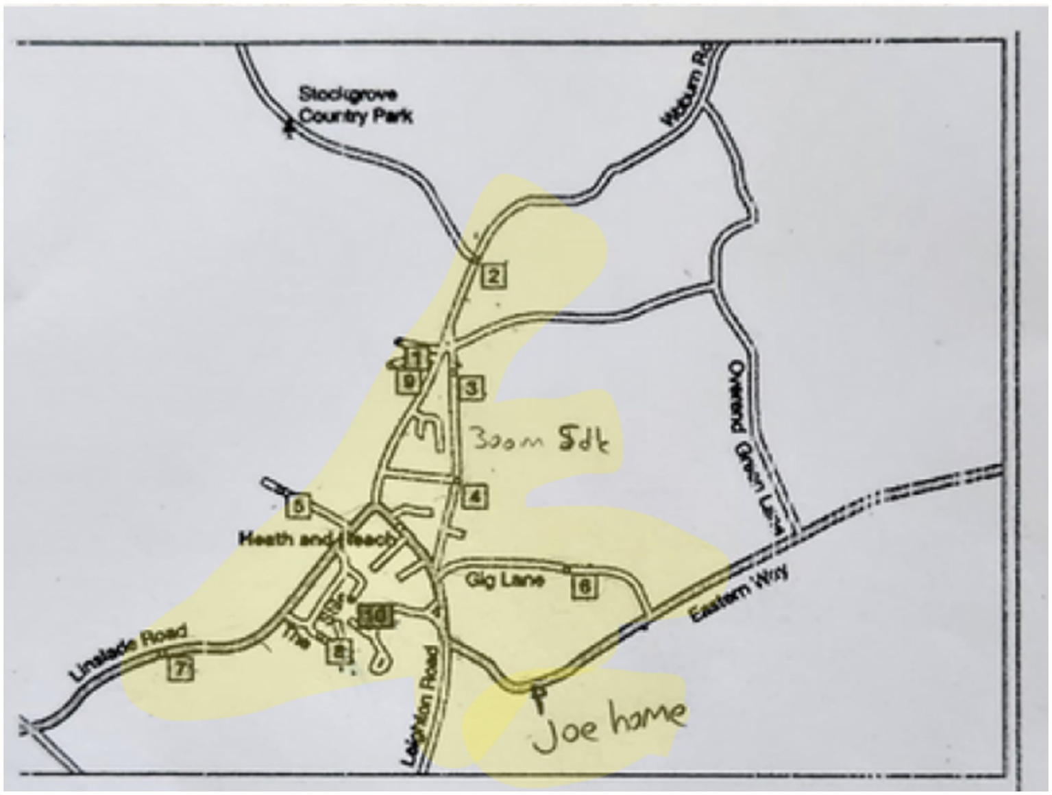 Map showing a network of roads including Heath and Reach, Gig Lane, and Linslade Road. Features locations like Stockgrove Country Park and Joe's home. Some areas are highlighted in yellow, and there is a note indicating a distance of three hundred meters south.