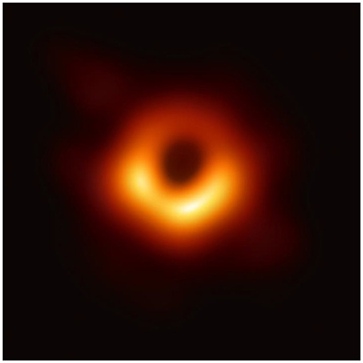 Figure 2 - The silhouette of the super-massive black hole at the center of a galaxy called M87, seen against the gas that surrounds it, which heats up and shines (Photo credit: Event Horizon Telescope).