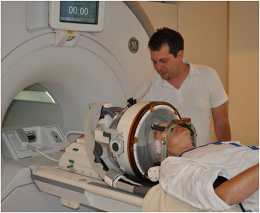 Figure 3 - FUS system with GE MRI, that is used to treat conditions in the brain (Reprint. Figure 1 from Magara et al. [2]. CC BY 2.0).
